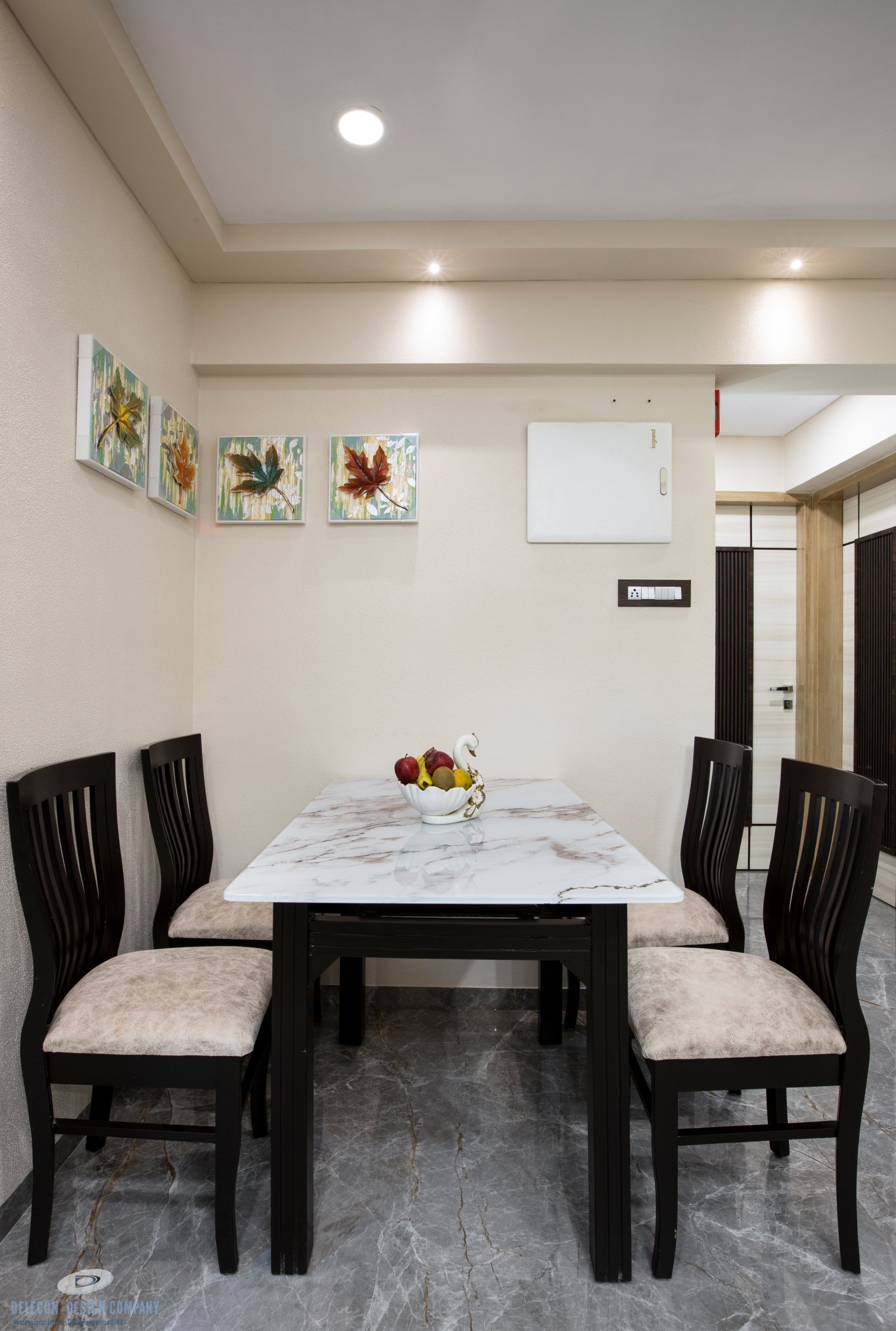 Dining space interior design near living room at Sai World City Panvel