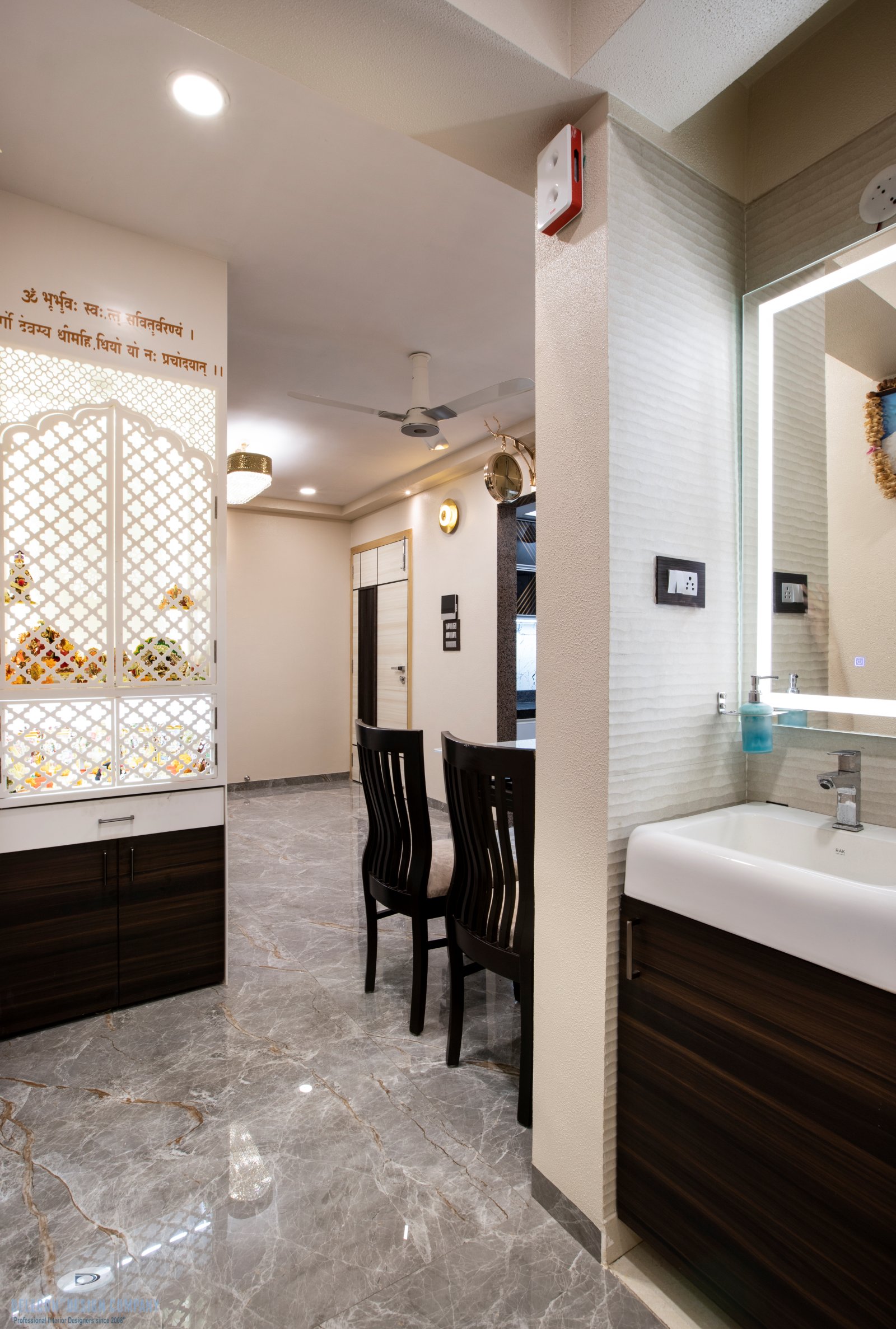 Dining area wall and storage design for 2BHK flat at Sai World City Panvel