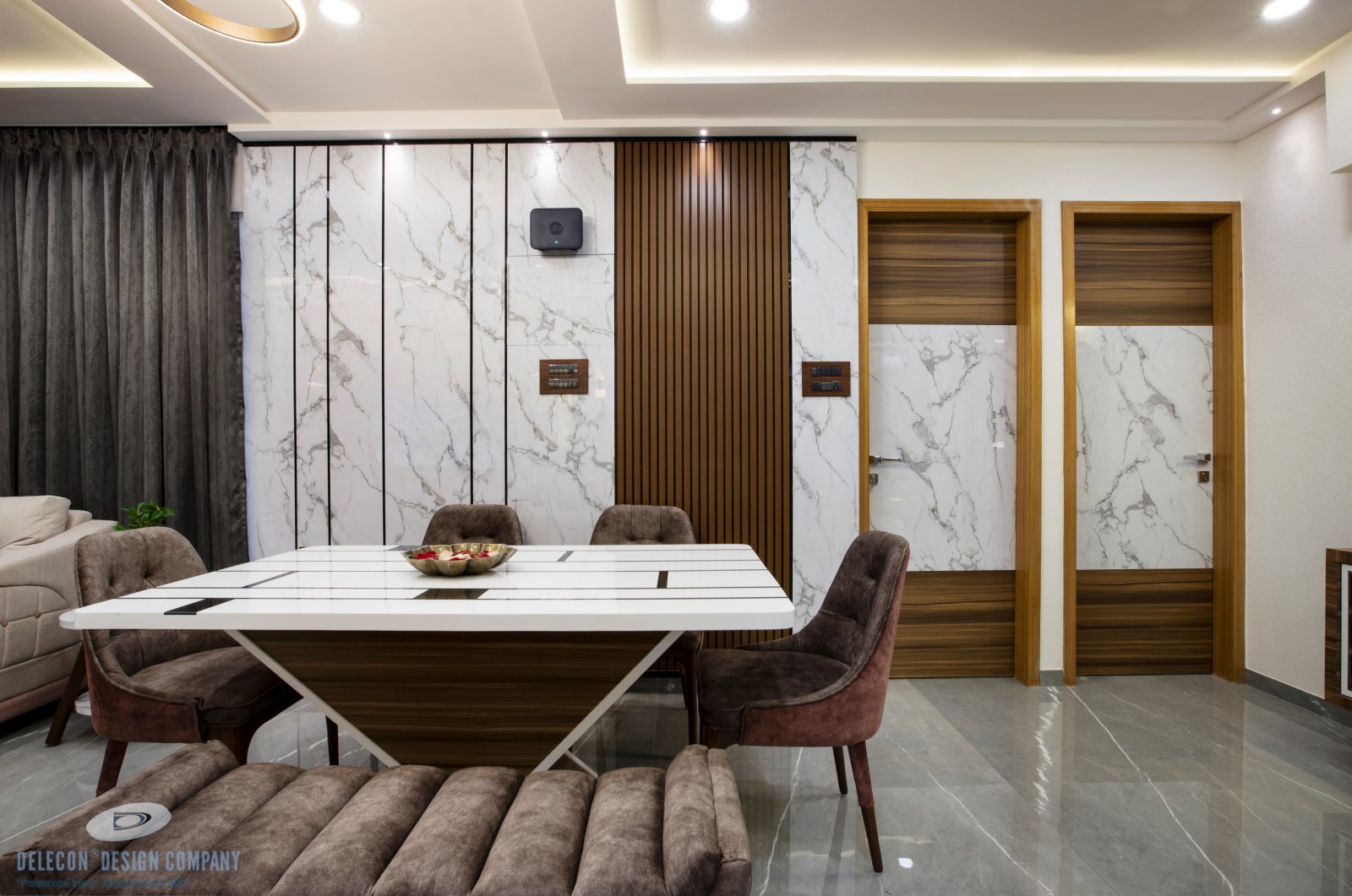 Dining space with customised black and white Corian dining table