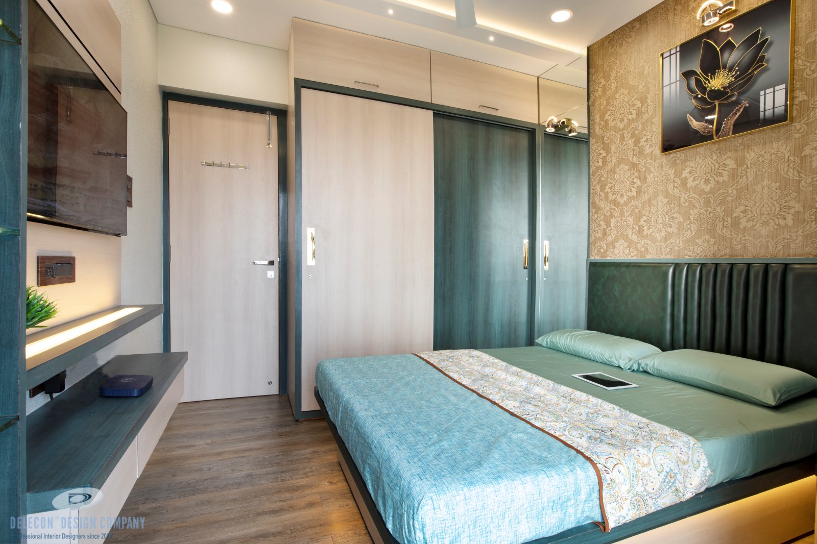 Guest bedroom design with modern headboard and storage in Bhagwati Greens flat