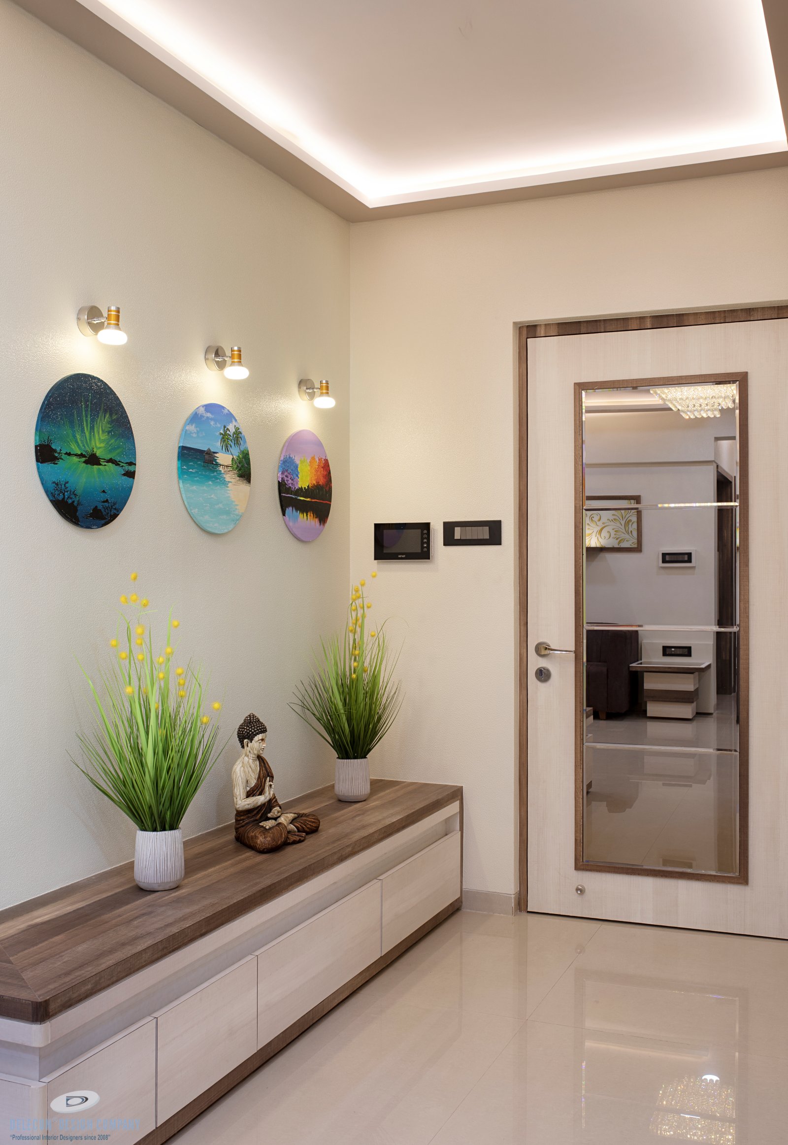 Home passage design with wall panelling and artwork