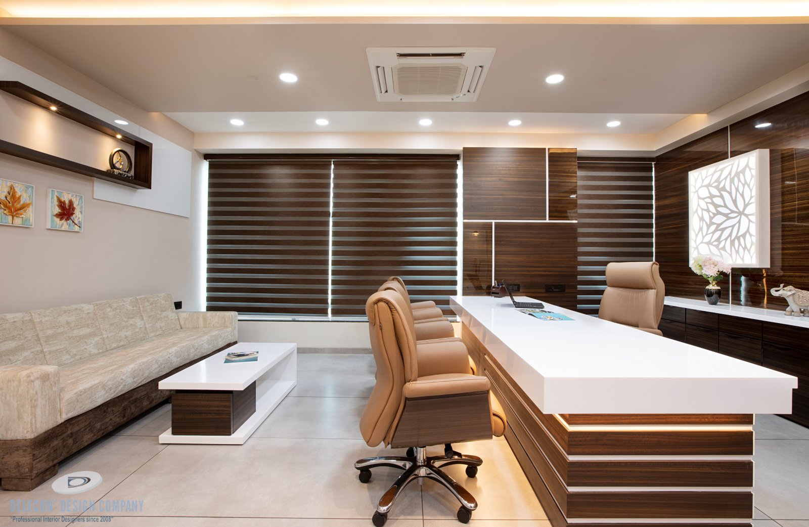 Director cabin with layered ceiling and lighting design