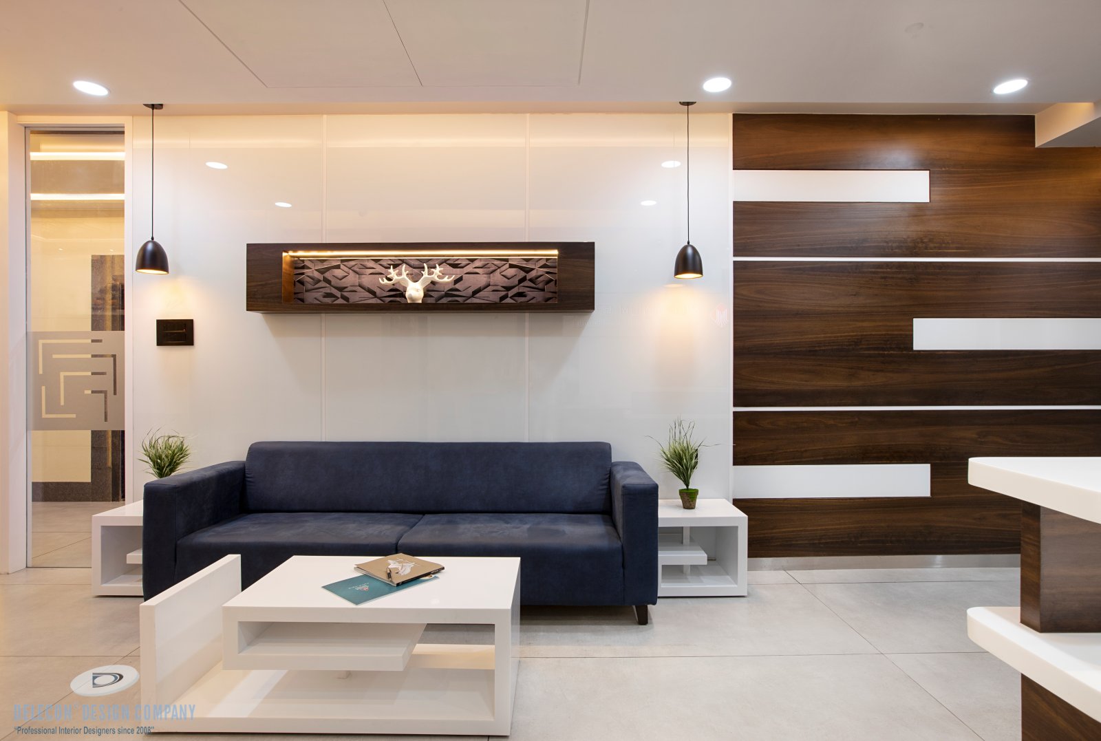 Waiting lounge view 3 showing wall panelling and artwork